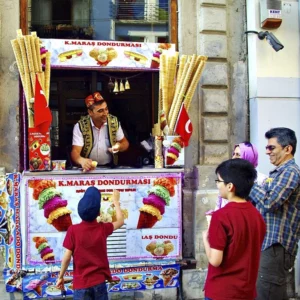 How does Marash's ice cream shop attract customers